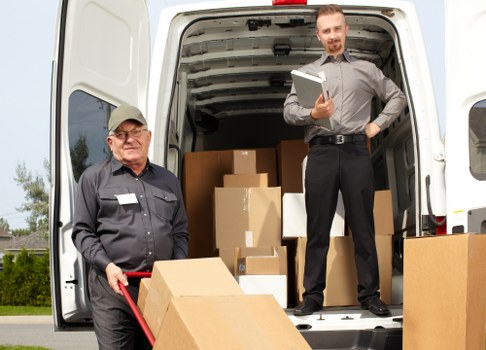 Local removals team handling furniture in Waterloo