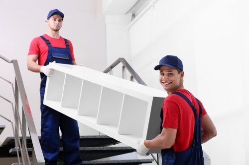 Professional furniture removals in Waterloo with moving team handling household items