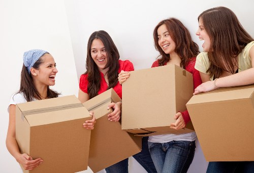 Students preparing boxes for a removal service in Waterloo