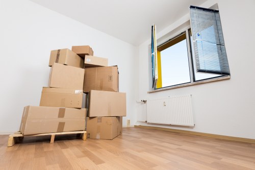 Removal team handling boxes safely during a planned move