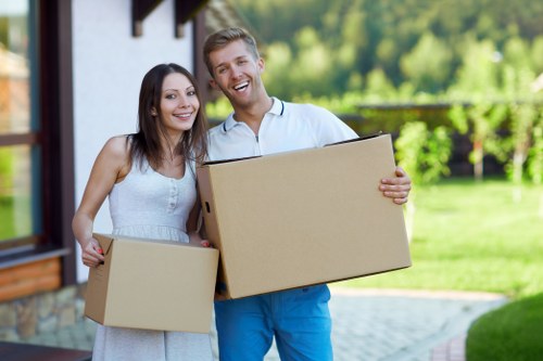 Local Waterloo movers handling furniture and packed boxes