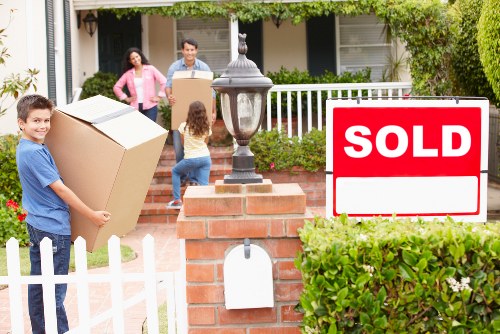 Supervisor discussing safety checks before a house move