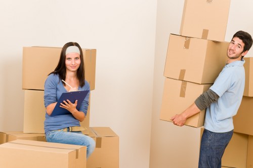 Packed moving boxes and furniture ready for same day removals in Waterloo